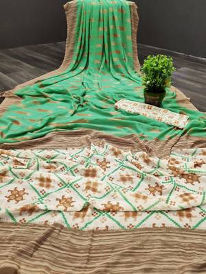 Green printed georgette saree with blouse 1