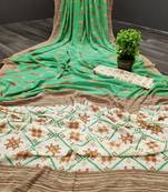 Green printed georgette saree with blouse