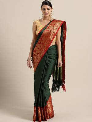 Dark green woven blended silk saree with blouse 1