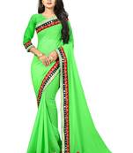 Parrot green woven organza saree with blouse