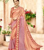 Peach embroidered lycra saree with blouse