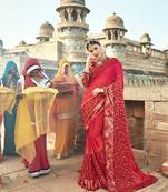 Red embroidered shimmer saree with blouse