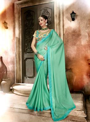 Green embroidered georgette saree with blouse 1