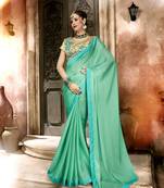 Green embroidered georgette saree with blouse
