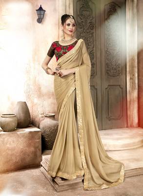 Beige embroidered georgette saree with blouse 1