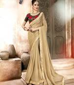 Beige embroidered georgette saree with blouse