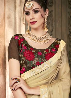 Beige embroidered georgette saree with blouse 2