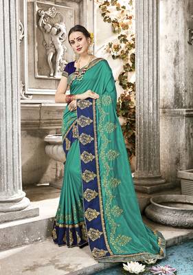 Green embroidered satin saree with blouse 1