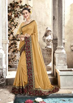 Cream embroidered satin saree with blouse 1