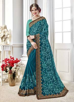 Blue embroidered georgette saree with blouse 1