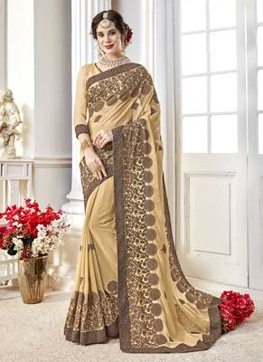 Cream embroidered georgette saree with blouse 1