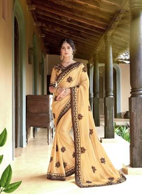Cream embroidered georgette saree with blouse 1