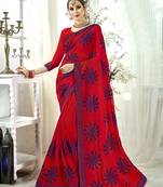 Red embroidered satin saree with blouse
