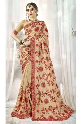 Cream embroidered satin saree with blouse 1