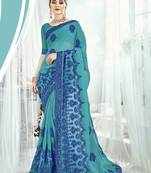 Sea green embroidered satin saree with blouse