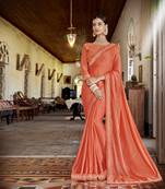 Orange embroidered satin saree with blouse
