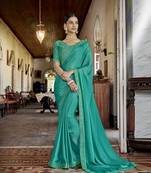 Sea green embroidered satin saree with blouse