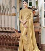 Golden embroidered satin saree with blouse