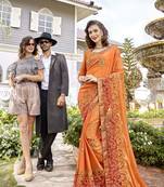 Orange embroidered georgette saree with blouse