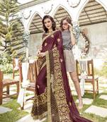Brown embroidered georgette saree with blouse