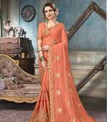 Peach embroidered georgette saree with blouse