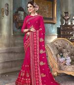 Pink embroidered georgette saree with blouse