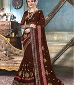 Brown embroidered georgette saree with blouse