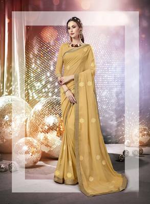 Cream embroidered georgette saree with blouse 1