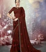 Brown embroidered georgette saree with blouse