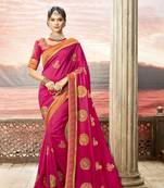 Pink embroidered satin saree with blouse