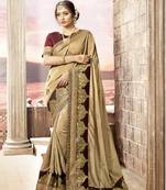 Orange embroidered satin saree with blouse