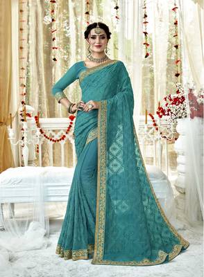 Sky blue embroidered georgette saree with blouse 1