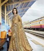 Golden embroidered lycra saree with blouse