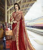 Maroon embroidered lycra saree with blouse