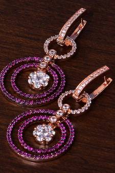 Ruby Embellished Rose Gold Plated American Diamond Earrings 216ED272