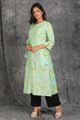 Pistachio Green Abstract Printed Cotton Kurti with Dori 1