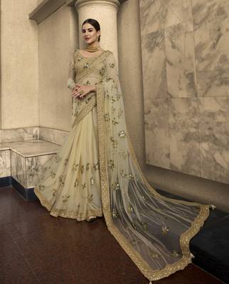 Cream Embroidered Net Saree With Blouse 2