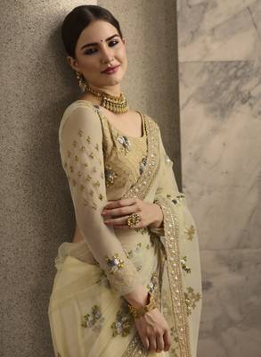 Cream Embroidered Net Saree With Blouse 3
