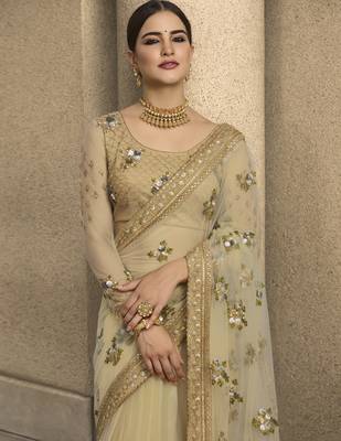 Cream Embroidered Net Saree With Blouse 4