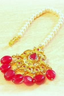 Beautiful ruby golden maang tikka