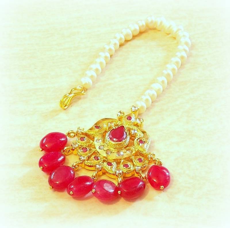 Beautiful ruby golden maang tikka