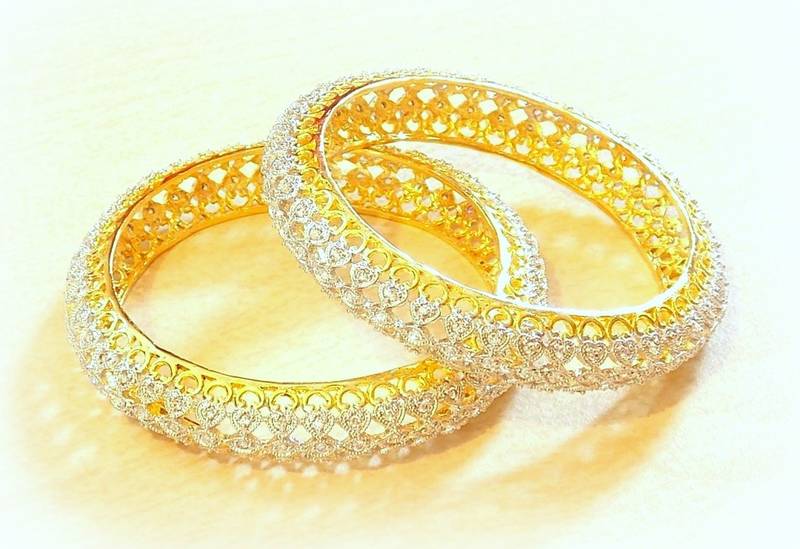 Fine ad stud bangles