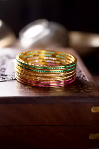 Beautiful Cz Ad Studded Gold Plated Traditional Red Green White American Diamond Bangles Set For Women