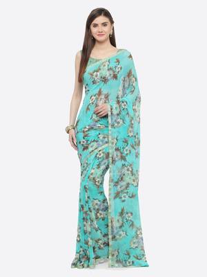 Turquoise printed georgette saree with blouse 1