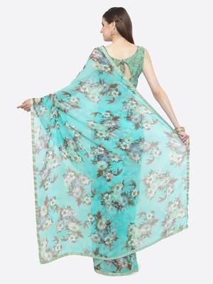 Turquoise printed georgette saree with blouse 2