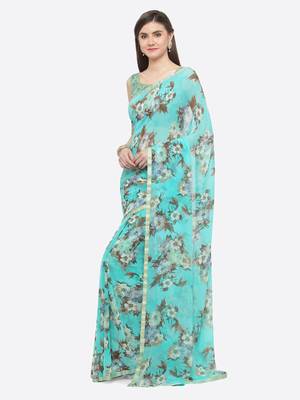 Turquoise printed georgette saree with blouse 3