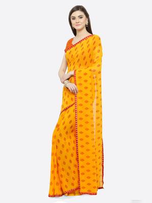Mustard printed georgette saree with blouse 3