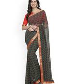 Green printed georgette saree with blouse