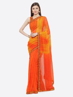 Orange printed georgette saree with blouse 1