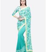 Turquoise printed georgette saree with blouse